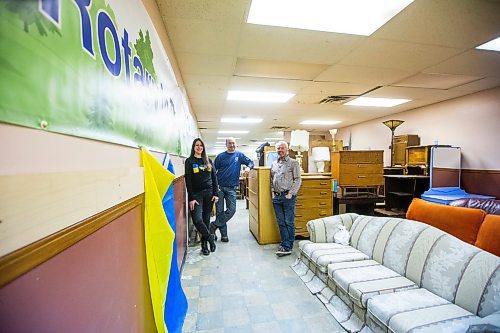 MIKAELA MACKENZIE / WINNIPEG FREE PRESS

Mandy Kwasnica (project coordinator with the Charleswood Rotary Club, left), Rod Delisle (with the Charleswood Rotary Club), and Dave Wiebe at their warehouse, where they store free furniture that they&#x576;e picked up and will deliver for Ukrainian newcomers, in Winnipeg on Tuesday, Dec. 5, 2023. For faith story.
Winnipeg Free Press 2023