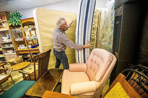 MIKAELA MACKENZIE / WINNIPEG FREE PRESS

Dave Wiebe shows the mattresses, which are typically the first thing that Ukrainian newcomers take, in Winnipeg on Tuesday, Dec. 5, 2023. For faith story.
Winnipeg Free Press 2023