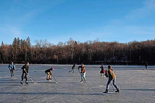 06122023
Grades seven to nine students from Assiniboine Valley Christian School took advantage of the mild weather and lack of snow to spend the afternoon skating and playing hockey on Lake Clementi south of Brandon. Environment Canada is calling for snow in Brandon on Friday. (Tim Smith/The Brandon Sun)