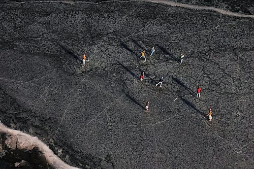 06122023
Grades seven to nine students from Assiniboine Valley Christian School took advantage of the mild weather and lack of snow to spend the afternoon skating and playing hockey on Lake Clementi south of Brandon, as seen from a Brandon Flight Centre Piper Cherokee 140. Environment Canada is calling for snow in Brandon on Friday. (Tim Smith/The Brandon Sun)