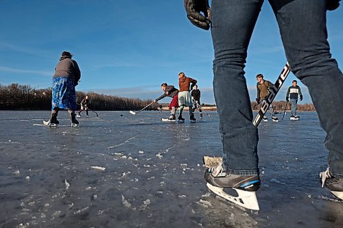 06122023
Grades seven to nine students from Assiniboine Valley Christian School took advantage of the mild weather and lack of snow to spend the afternoon skating and playing hockey on Lake Clementi south of Brandon. Environment Canada is calling for snow in Brandon on Friday. (Tim Smith/The Brandon Sun)