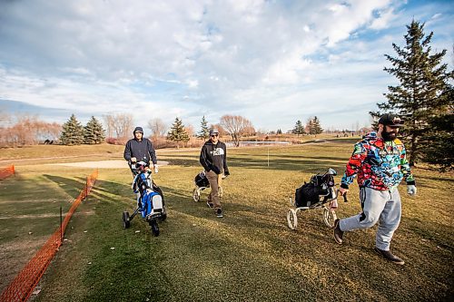 MIKAELA MACKENZIE / WINNIPEG FREE PRESS
	
Golfers Nick Mulvey (left), Brian Stover, and Philip Da Silva play at the Southside Golf Course, which is open in December for the first time ever due to the unusually mild weather, on Thursday, Dec. 7, 2023. 
Winnipeg Free Press 2023
