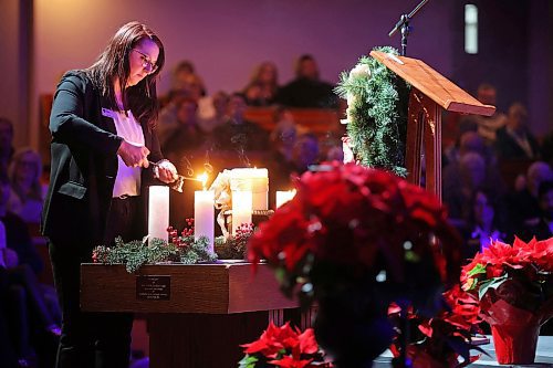 07122023
Zoey Black lights the Candle of Thanksgiving during the Brockie Donovan Tree of Memories 26th Annual Community Candlelight Memorial Service at the McDiarmid Drive Alliance Church on Thursday evening.    (Tim Smith/The Brandon Sun)