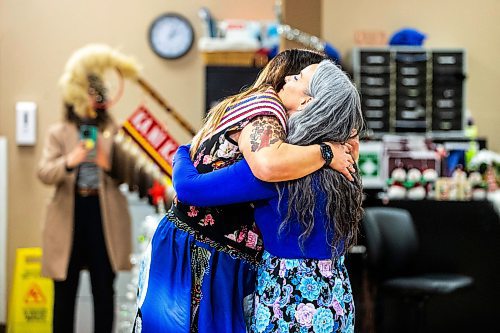 MIKAELA MACKENZIE / WINNIPEG FREE PRESS
	
Families minister Nahanni Fontaine (front) hugs housing, addictions and homelessness minister Bernadette Smith at the launch of the new MMIWG licence plates at Ka Ni Kanichih on Friday, Dec. 8, 2023. For Malak story.
Winnipeg Free Press 2023