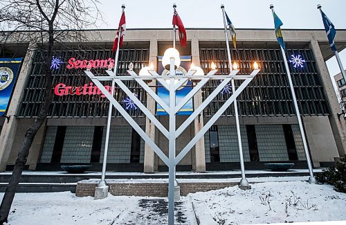 A menorah has been replaced at Winnipeg’s city hall on Monday, Dec. 11. The city and police removed the menorah on the weekend. (John Woods/Winnipeg Free Press)
