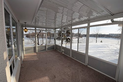 Todd Lewys / Winnipeg Free Press
Solid, secure and newly carpeted, the three-season sunroom is a great spot to enjoy captivating river views in spring, summer and fall.