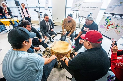 MIKAELA MACKENZIE / WINNIPEG FREE PRESS
	
Premier Wab Kinew joins the Sons of the Drum singers in an opening song at Portage Place on Tuesday, Dec. 12, 2023. For Joyanne story.
Winnipeg Free Press 2023