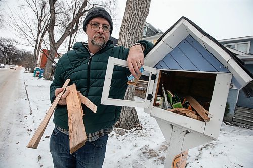 JOHN WOODS / WINNIPEG FREE PRESS
Wolseley resident Tim Osmond has switched his tiny library into a tiny pantry with food and kindling and is photographed outside his home Tuesday, December 12, 2023. Osmond decided to switch over when he saw someone take the books that used to fill the library and head to the river to where he presumes the books were used as kindling to like a fire at an encampment.

Reporter: nicole