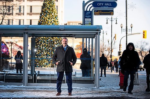 MIKAELA MACKENZIE / WINNIPEG FREE PRESS
	
Robert Chrismas, leader of the incoming transit security force (and former police officer), at the City Hall transit stop on Wednesday, Dec. 13, 2023. For Tyler story.
Winnipeg Free Press 2023