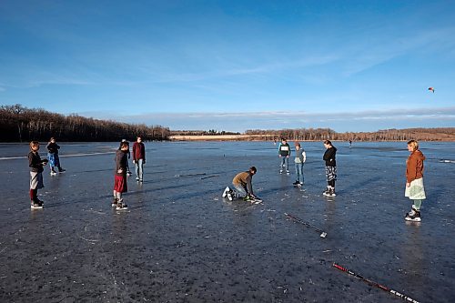 06122023
Grades seven to nine students from Assiniboine Valley Christian School took advantage of the mild weather and lack of snow to spend the afternoon skating and playing hockey on Lake Clementi south of Brandon. (Tim Smith/The Brandon Sun)