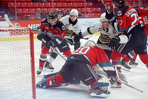 13122023
Matt Henry #67 of the Brandon Wheat Kings gets stuck between goalie Jari Kykkanen #30 and Kayden Sadhra-Kang #27 of the Kelowna Rockets during WHL action at Westoba Place on Wednesday evening.   (Tim Smith/The Brandon Sun)