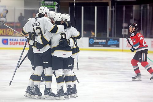 13122023
Brandon Wheat Kings players celebrate a goal by Quinn Mantei #8 during WHL action against the Kelowna Rockets at Westoba Place on Wednesday evening.   (Tim Smith/The Brandon Sun)