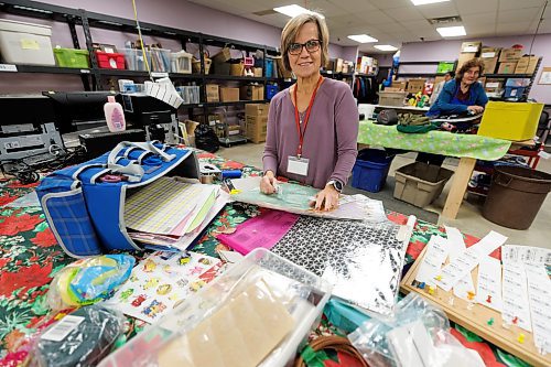 MIKE DEAL / WINNIPEG FREE PRESS
Marlene Penner, 59, volunteers at the Kildonan MCC Thrift Shop, where she sorts and prices craft-related donations.
See Aaron App story
231214 - Thursday, December 14, 2023.