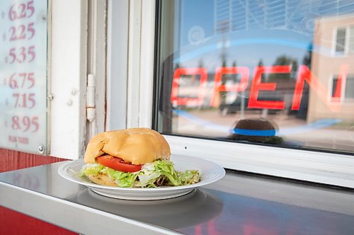 JESSICA LEE / WINNIPEG FREE PRESS



The burger for Le Burger Week from The White Top Drive-In is photographed on September 12, 2022 in front of the eatery.



Reporters: AV Kitching and Ben Waldman