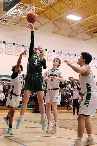 16122023
Sam Manko #4 of the Neelin Spartans leaps to let a shot off on net during the Spartans 20th annual Brandon Sun Spartan Invitational game against the Dauphin Clippers at &#xc9;cole Secondaire Neelin High School on Friday.
(Tim Smith/The Brandon Sun)