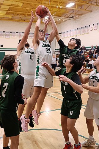 16122023
Ronin Mouck #23 of the Dauphin Clippers leaps to let a shot off on net during the Clippers 20th annual Brandon Sun Spartan Invitational game against the Neelin Spartans at &#xc9;cole Secondaire Neelin High School on Friday.
(Tim Smith/The Brandon Sun)