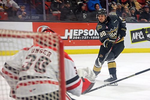 16122023
Matteo Michels #88 of the Brandon Wheat Kings takes a shot on netminder Jackson Unger #30 of the Moose Jaw Warriors during WHL action at Westoba Place on Saturday evening.
(Tim Smith/The Brandon Sun)