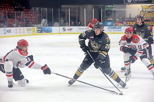 16122023
Hayden Wheddon #20 of the Brandon Wheat Kings fires a shot on net as Aiden Ziprick #21 of the Moose Jaw Warriors tries to block the shot during WHL action at Westoba Place on Saturday evening.
(Tim Smith/The Brandon Sun)