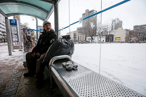 JOHN WOODS / WINNIPEG FREE PRESS
Jolly Cabigting sits in a bus shelter on Graham Avenue in Winnipeg Sunday, December 17, 2023. 

Reporter: gabby