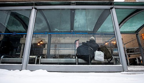 JOHN WOODS / WINNIPEG FREE PRESS
Jolly Cabigting sits in a bus shelter on Graham Avenue in Winnipeg Sunday, December 17, 2023. 

Reporter: gabby