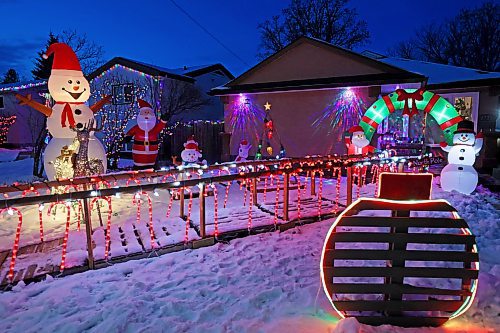 18122023
The spirit of Christmas is on full display at Jeff and Tara Carey's brightly decorated home along the 2700 block of Princess Avenue on Monday evening. See story on Page A2.
(Tim Smith/The Brandon Sun)