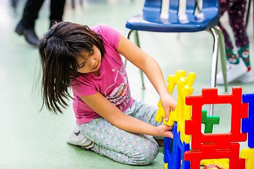 MIKAELA MACKENZIE / WINNIPEG FREE PRESS
	
Serena Spence (six) builds a structure while taking part in the Young Designer Program at Weston School on Wednesday, Dec. 13, 2023. For Maggie story.
Winnipeg Free Press 2023