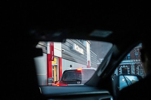 MIKAELA MACKENZIE / WINNIPEG FREE PRESS
	
Wab Kinew makes a stop for coffee, a hashbrown, and a sausage and egg McMuffin at McDonald&#x573; on the way to work on Friday, Dec. 15, 2023. For Maggie story.
Winnipeg Free Press 2023