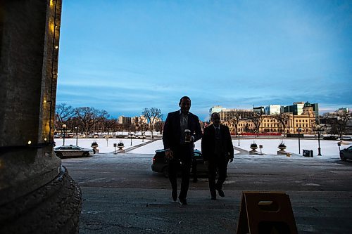 MIKAELA MACKENZIE / WINNIPEG FREE PRESS
	
Wab Kinew walks up the steps to the legislative building before the sun rises on Friday, Dec. 15, 2023. For Maggie story.
Winnipeg Free Press 2023