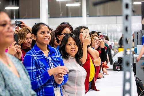 MIKAELA MACKENZIE / WINNIPEG FREE PRESS
	
Wab Kinew makes a short speech to employees during a tour of the Canada Goose factory on Friday, Dec. 15, 2023. For Maggie story.
Winnipeg Free Press 2023