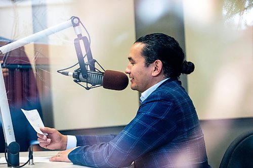 MIKAELA MACKENZIE / WINNIPEG FREE PRESS
	
Wab Kinew records a radio advertisement on Friday, Dec. 15, 2023. For Maggie story.
Winnipeg Free Press 2023