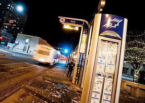 JOHN WOODS / WINNIPEG FREE PRESS
A bus and signage on Graham Avenue in Winnipeg Monday, December  18, 2023. 

Reporter: ?