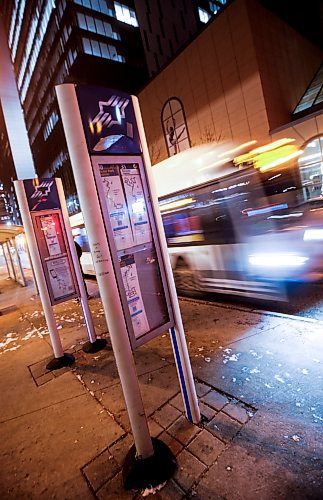 JOHN WOODS / WINNIPEG FREE PRESS
A bus and signage on Graham Avenue in Winnipeg Monday, December  18, 2023. 

Reporter: ?