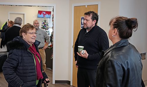 Brandon East NDP MLA Glen Simard (centre) speaks with constituents at a joint Christmas open house and grand opening for his constituency office at 217 10th St. The office is at the same location that Simard's predecessor, Len Isleifson, had his. The office is located on the second floor of the building, which is wheelchair accessible through an elevator on the ground floor. The office will usually be open from 10 a.m. to 3 p.m., Monday to Friday. Because Simard goes back and forth to Winnipeg for work, he is not present every day. The office can set up meetings in advance if constituents call 204-717-1799 or email Glen.Simard@YourManitoba.ca (Colin Slark/The Brandon Sun)