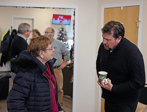 Brandon East NDP MLA Glen Simard (right) speaks with constituents at a joint Christmas open house and grand opening for his constituency office at 217 10th St. on Dec. 19. The office is at the same location that Simard's predecessor, Len Isleifson, had his. The office is located on the second floor of the building, which is wheelchair accessible through an elevator on the ground floor. The office will usually be open from 10 a.m. to 3 p.m., Monday to Friday. Because Simard goes back and forth to Winnipeg for work, he is not present every day. The office can set up meetings in advance if constituents call 204-717-1799 or email Glen.Simard@YourManitoba.ca (Colin Slark/The Brandon Sun)