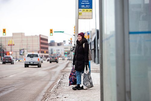 MIKAELA MACKENZIE / WINNIPEG FREE PRESS
	
Eva Wasney takes the bus with bags of groceries in Winnipeg on Wednesday, Dec. 20, 2023. For Eva story.
Winnipeg Free Press 2023