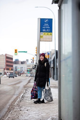 MIKAELA MACKENZIE / WINNIPEG FREE PRESS
	
Eva Wasney takes the bus with bags of groceries in Winnipeg on Wednesday, Dec. 20, 2023. For Eva story.
Winnipeg Free Press 2023