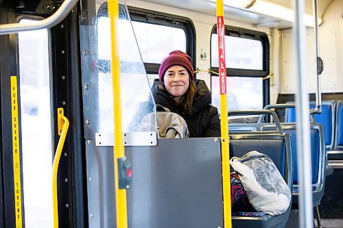 MIKAELA MACKENZIE / WINNIPEG FREE PRESS
	
Eva Wasney takes the bus with bags of groceries in Winnipeg on Wednesday, Dec. 20, 2023. For Eva story.
Winnipeg Free Press 2023