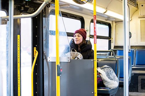 MIKAELA MACKENZIE / WINNIPEG FREE PRESS
	
Eva Wasney takes the bus with bags of groceries in Winnipeg on Wednesday, Dec. 20, 2023. For Eva story.
Winnipeg Free Press 2023