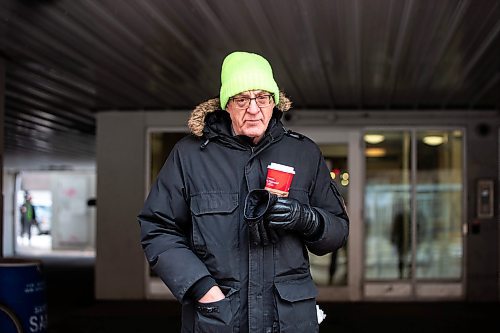 MIKAELA MACKENZIE / WINNIPEG FREE PRESS
	
Arthur Szymkow, who lives across the alley from the scene, at 24 Carlton Street on Wednesday, Dec. 20, 2023. For Erik story.
Winnipeg Free Press 2023