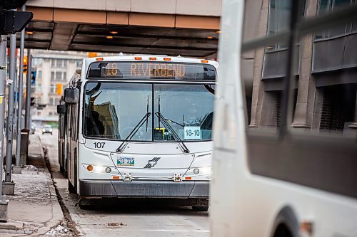 MIKAELA MACKENZIE / WINNIPEG FREE PRESS
	
Winnipeg Transit buses on Graham Avenue on Wednesday, Dec. 20, 2023. For transit series.
Winnipeg Free Press 2023