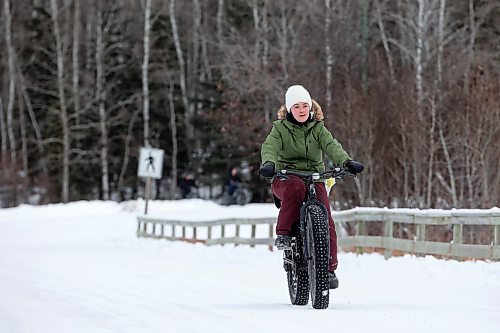 20122023
A visitor to Riding Mountain National Park rides a fat bike along a road in Wasagaming on a mild and quiet Wednesday in the park. 
(Tim Smith/The Brandon Sun)
