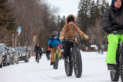 20122023
Visitors to Riding Mountain National Park ride fat bikes along a road in Wasagaming on a mild and quiet Wednesday in the park. 
(Tim Smith/The Brandon Sun)