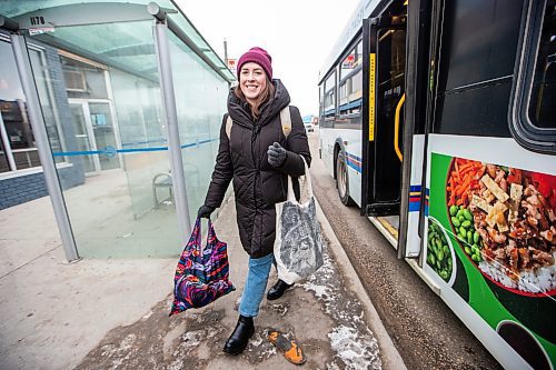 MIKAELA MACKENZIE / WINNIPEG FREE PRESS
	
Eva Wasney takes the bus with bags of groceries in Winnipeg on Wednesday, Dec. 20, 2023. For Eva story.
Winnipeg Free Press 2023