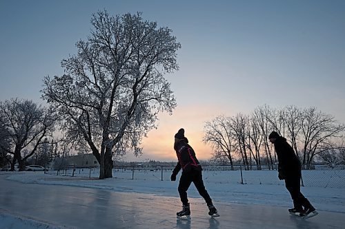 22122023
Ice skaters glide along the ice at the Brandon Skating Oval at sunset on Friday afternoon. After a mild start to winter the oval opened to the public Thursday. 
(Tim Smith/The Brandon Sun)