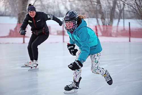 22122023
Sophia Forbes and her mom Jen skate together at the Brandon Skating Oval at sunset on Friday afternoon. Sophia and her sister Zoe are members of the Westman Speed Skating Club and Jen helps coach. (Tim Smith/The Brandon Sun)