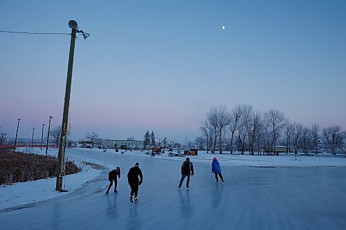 22122023
Ice skaters glide along the ice at the Brandon Skating Oval at dusk on Friday. After a mild start to winter the oval opened to the public Thursday. 
(Tim Smith/The Brandon Sun)