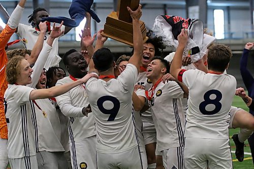 The Brandon University Bobcats celebrate their MCAC men's soccer championship after beating the Providence Pilots 1-0 the final on Oct. 31. (Thomas Friesen/The Brandon Sun)