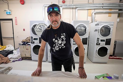 RUTH BONNEVILLE / WINNIPEG FREE PRESS

Local -  N'Dinawemak 

Feature pm  N'Dinawemak &#x2014; Our Relatives' Place at 190 Disraeli Freeway and some of their clients that have become volunteers at the centre.  

Photo of client, Jason Kennedy, who volunteers his time doing laundry for the centre,  

Feature by Niigaan 

Dec 21st,  2023