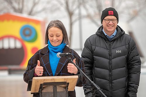 BROOK JONES / WINNIPEG FREE PRESS
The skating rinks and trails at The Forks have been named Winnipeg 150 Winter Park to honour the city's 150th birthday. The Canopy Rink at The Forks also opened to the public during the monrning of Friday, Dec. 22, 2023. Pictured: The Forks North Portage President and CEO Sara Stasiuk (left) gives thumbs up during the formal announcement at The Forks in Winnipeg, Man., Friday, Dec. 22, 2023. Also pictured is Winnipeg Mayor's Scott Gillingham.