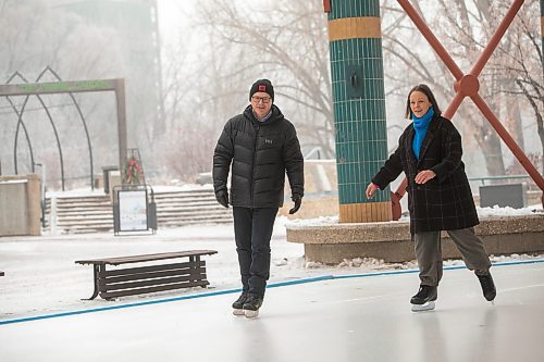 BROOK JONES / WINNIPEG FREE PRESS
The skating rinks and trails at The Forks have been named Winnipeg 150 Winter Park to honour the city's 150th birthday. The Canopy Rink at The Forks also opened to the public during the monrning of Friday, Dec. 22, 2023. Pictured: Winnipeg Mayor Scott Gillingham (left) and The Forks North Portage President and CEO Sara Stasiuk skate on the Canopy Rink following the formal announcement at The Forks in Winnipeg, Man., Friday, Dec. 22, 2023.